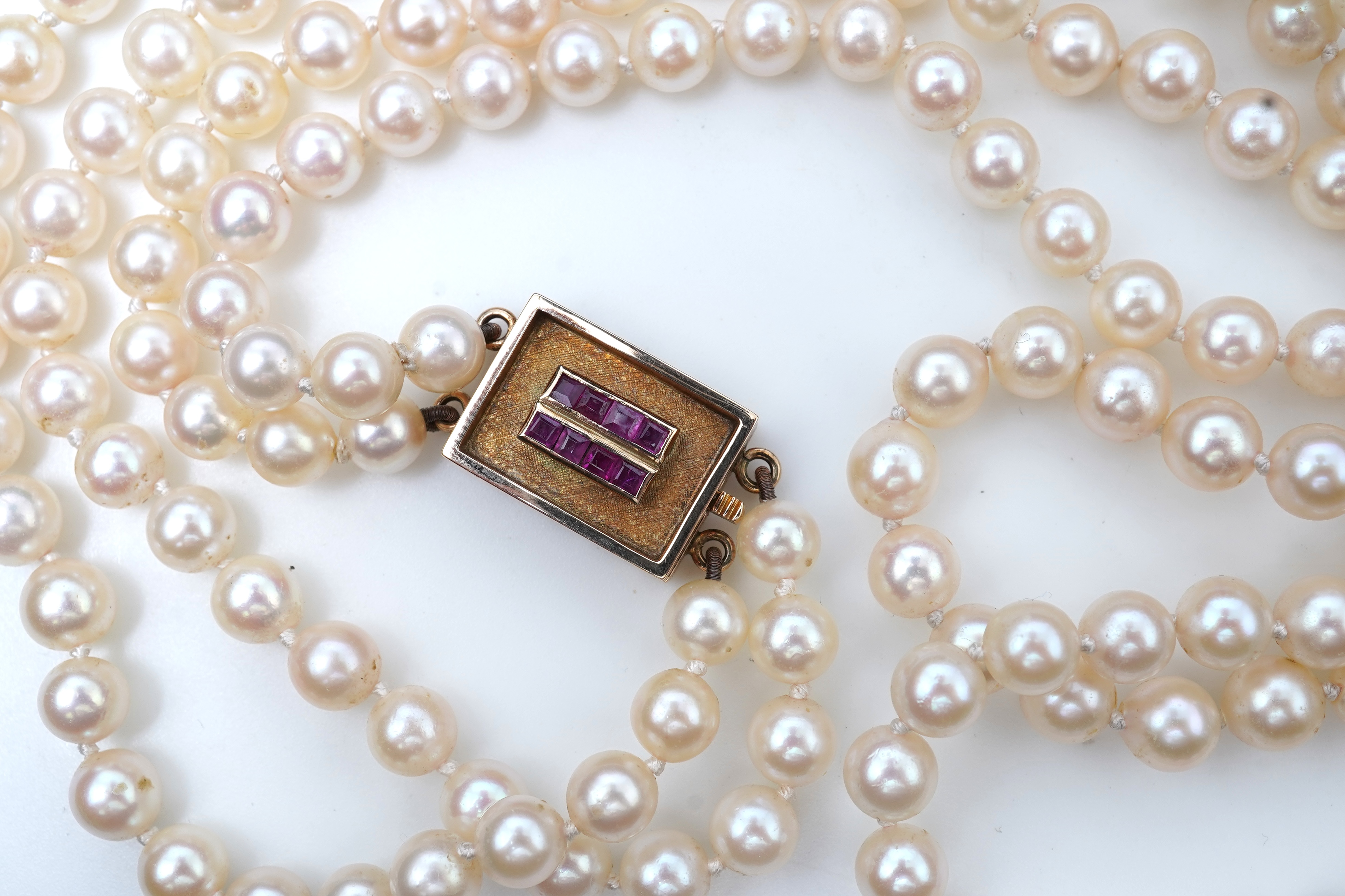 A cultured pearl and ruby necklace